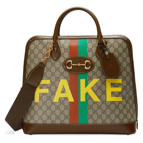 fake gucci overnight bag|is my gucci bag real.